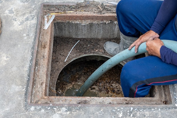 grease trap pumping involves removing built-up grease and food particles from the trap to prevent clogs and backups